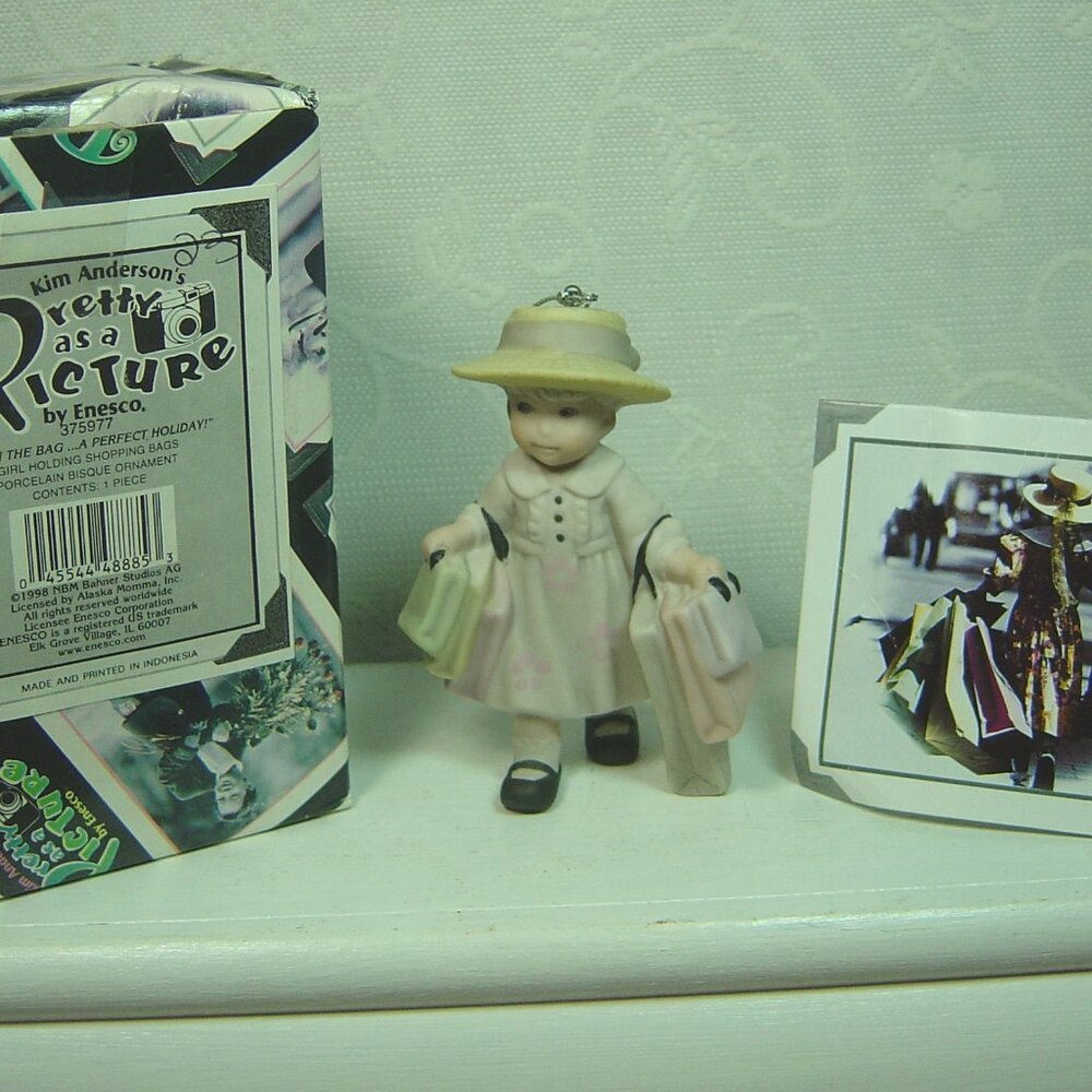 Kim Anderson Pretty as a Picture ornament-"It's in the Bag.. A Perfect Holiday"